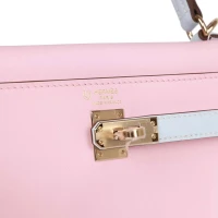 Hermes Special Order (HSS) Kelly Retourne 25 Rose Sakura and Bleu Brume Swift Permabrass Hardware Hermes Special Order (HSS) Kelly Retourne 25 Rose Sakura and Bleu Brume Swift Permabrass Hardware